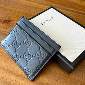 Gucci black leather GG card holder